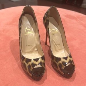 Selling Louboutin platform heels in size 37 animal print